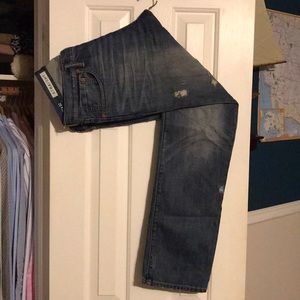 Distressed medium wash jeans